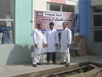 In front of the orthopaedic workshop in Kunduz